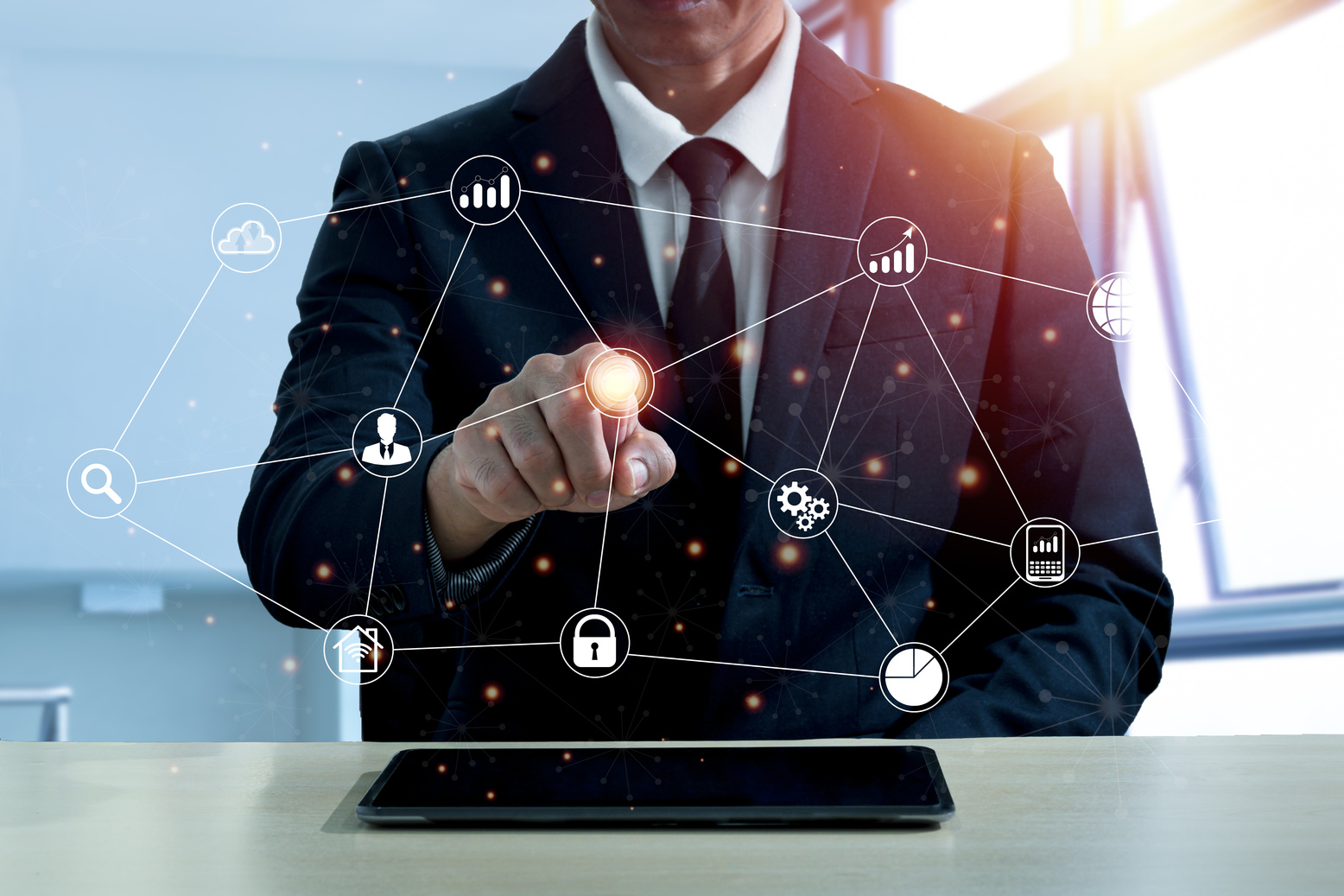 Businessman Pointing at a Digital Chart